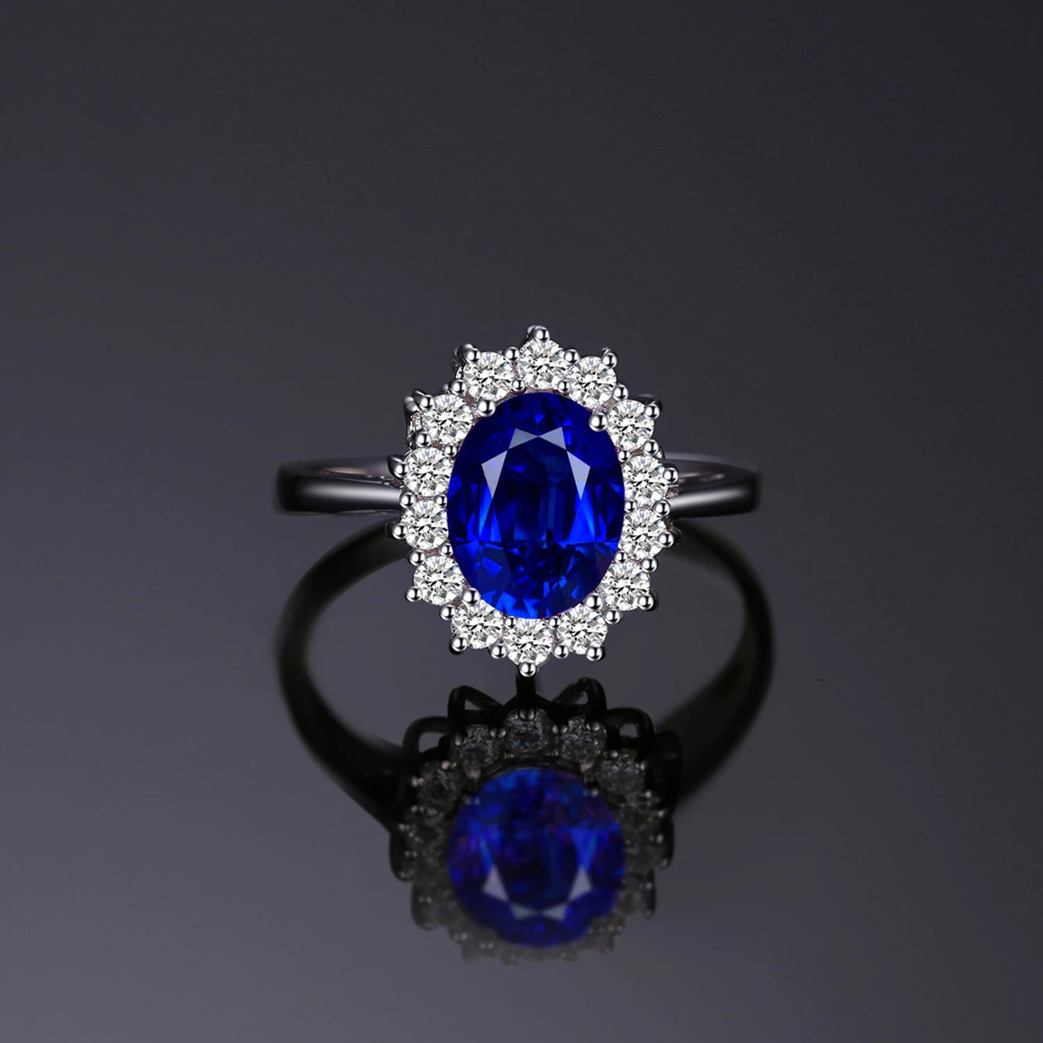 Princess Diana sapphire ring in 925 silver with a large blue sapphire gemstone and intricate silver band design.