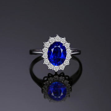Princess Diana sapphire ring in 925 silver with a large blue sapphire gemstone and intricate silver band design.
