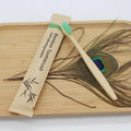 Reusable eco-friendly bamboo toothbrush by Craft Plus with natural bamboo handle and soft bristles for sustainable oral care.