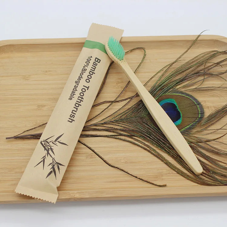 Reusable eco-friendly bamboo toothbrush by Craft Plus with natural bamboo handle and soft bristles for sustainable oral care.