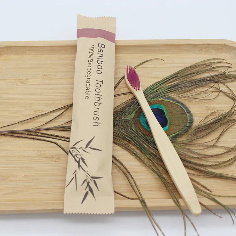 Reusable eco-friendly bamboo toothbrush by Craft Plus with natural bamboo handle and soft bristle head for sustainable oral care.