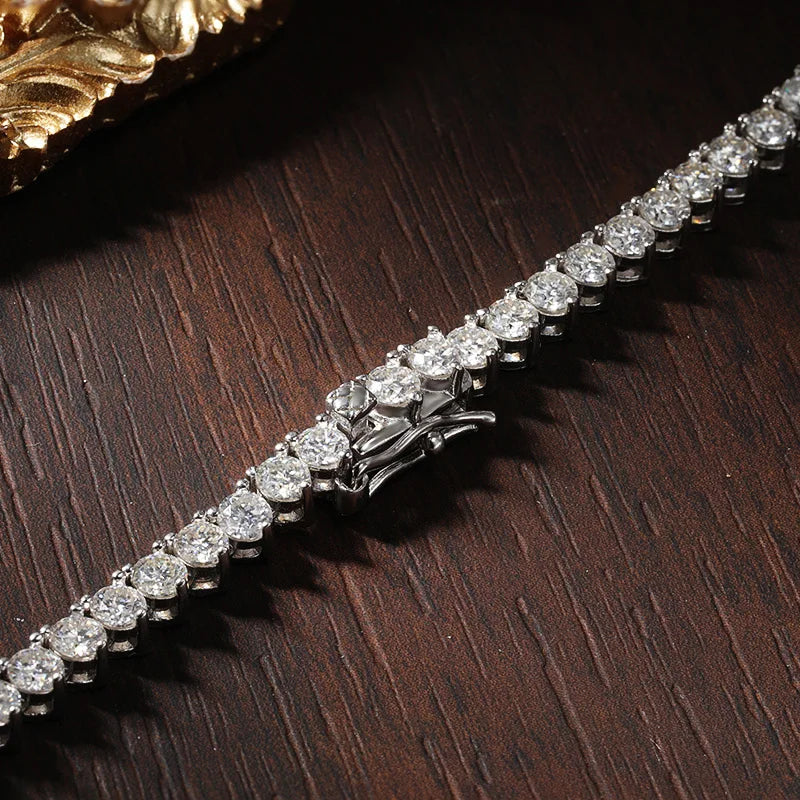 Sterling silver Moissanite tennis necklace with sparkling stones, crafted by Craft Plus, displayed on a neutral background.