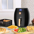 Craft Plus 5.5L digital air fryer with 1700W power and touchscreen display, shown on a kitchen countertop.