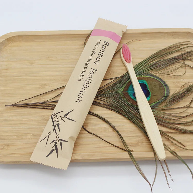 Reusable eco-friendly bamboo toothbrush by Craft Plus with natural bamboo handle and soft bristles for sustainable oral care.