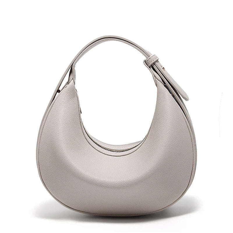 Retro women's crossbody bag by Craft Plus featuring trendy design, adjustable strap, and stylish vintage-inspired look.