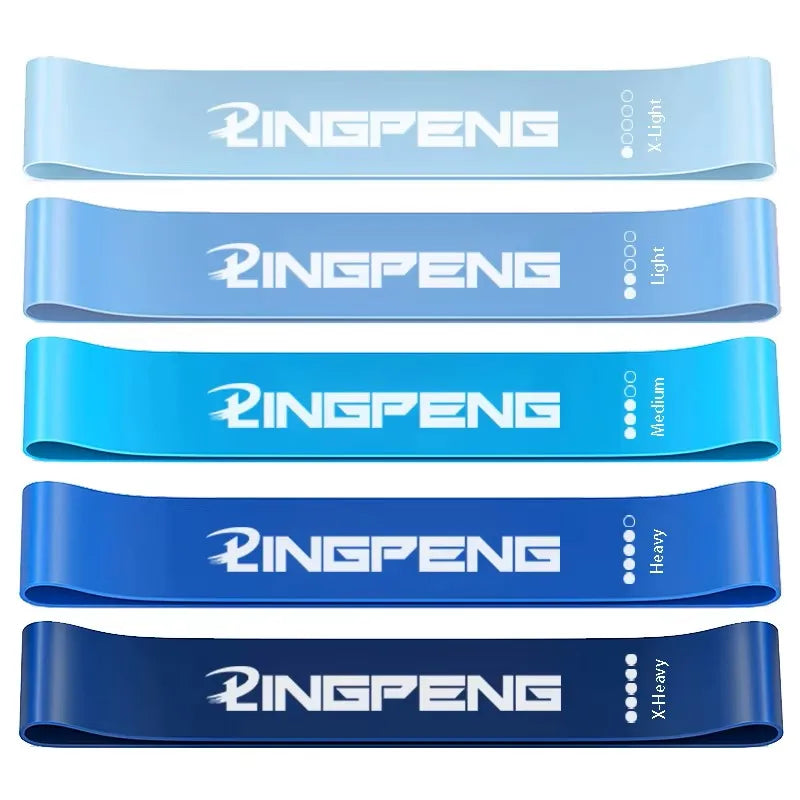 Set of Craft Plus resistance bands for yoga and fitness training, including multiple elastic bands in various colors and lengths