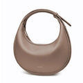 Retro women's crossbody bag by Craft Plus with trendy design, featuring a compact style and stylish strap, showcased in the image.