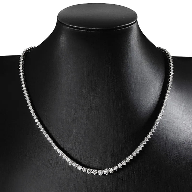 Sterling silver Moissanite tennis necklace with sparkling gemstones, crafted by Craft Plus, displayed on a neutral background.