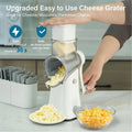 Craft Plus 5-in-1 rotary cheese and kitchen grater with multiple blades for grating cheese, vegetables, and more.