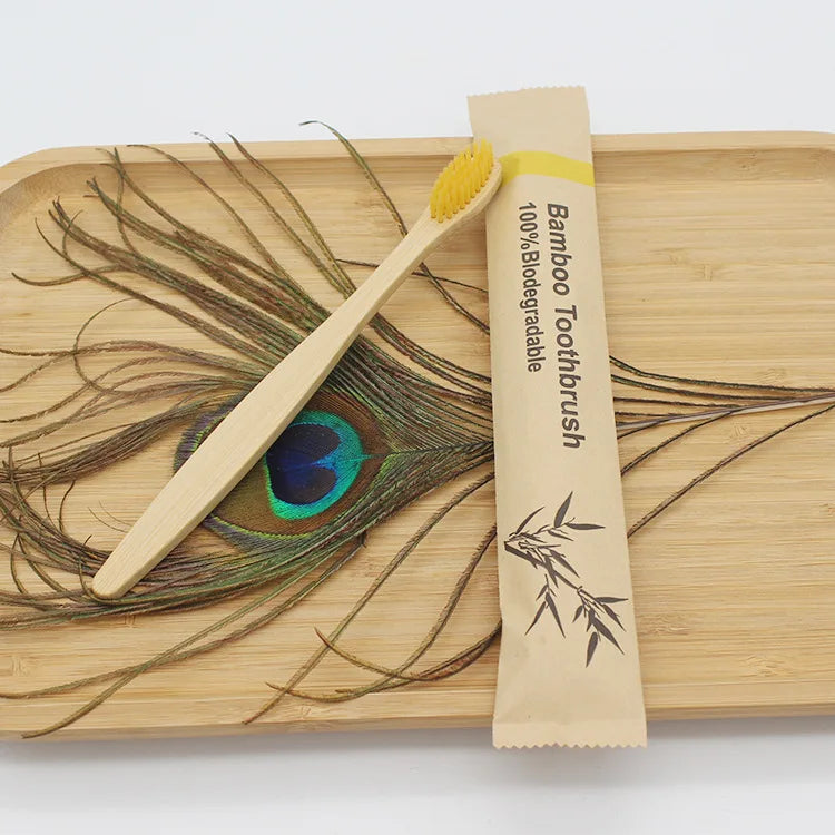 Craft Plus reusable eco-friendly bamboo toothbrush with natural bamboo handle and soft bristles on a white background.
