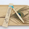 Reusable eco-friendly bamboo toothbrush with natural bamboo handle and soft bristles, ideal for sustainable oral care.
