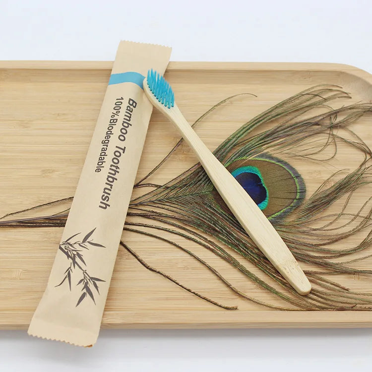 Reusable eco-friendly bamboo toothbrush with natural bamboo handle and soft bristles, ideal for sustainable oral care.