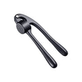 Craft Plus premium stainless steel garlic press with ergonomic handle, showcasing its durable construction and garlic crushing mechanism.