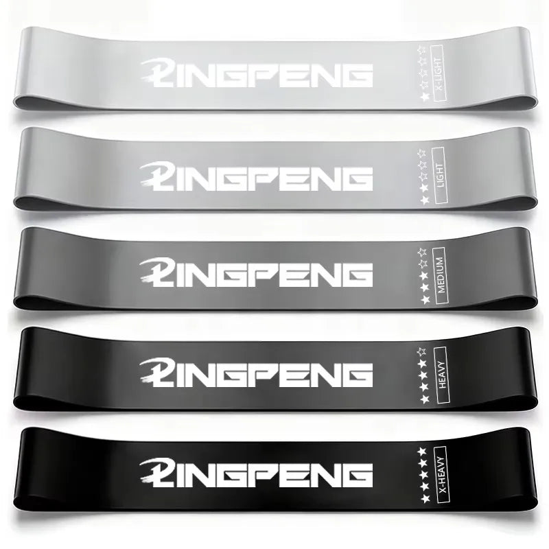 Set of Craft Plus resistance bands for yoga and fitness training, shown in various colors on a white background.