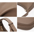 Trendy retro women's crossbody bag by Craft Plus with a stylish design and adjustable strap, shown in black with gold accents.