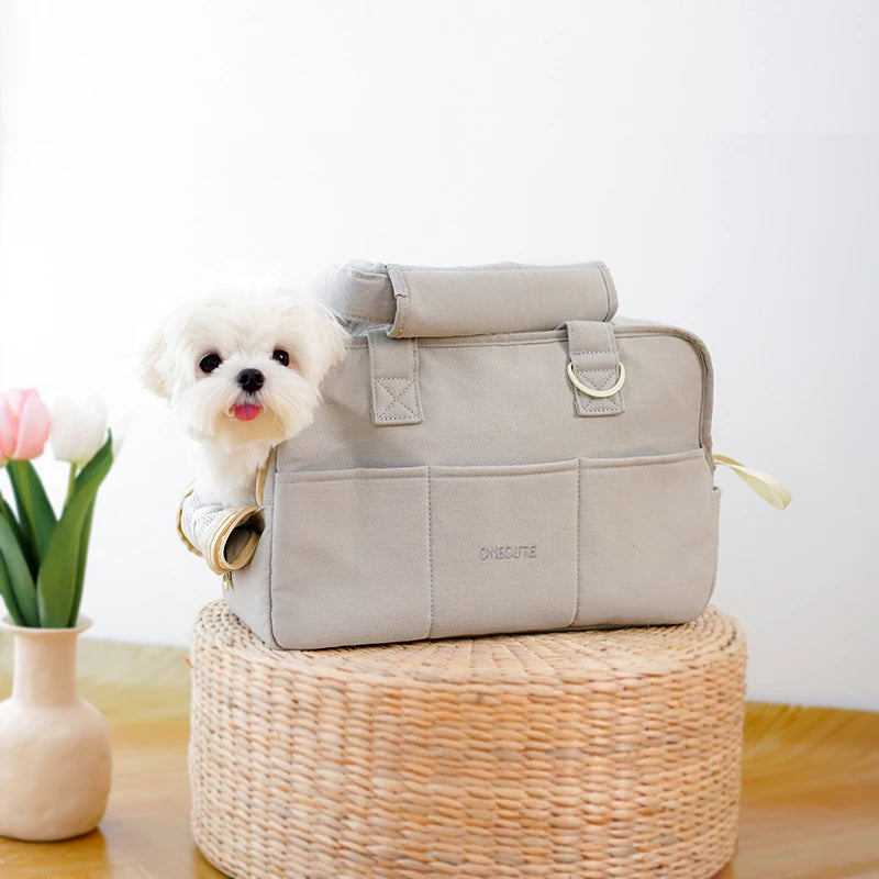 Craft Plus portable one-shoulder pet carrier bag with mesh sides and adjustable strap for comfortable pet transportation.
