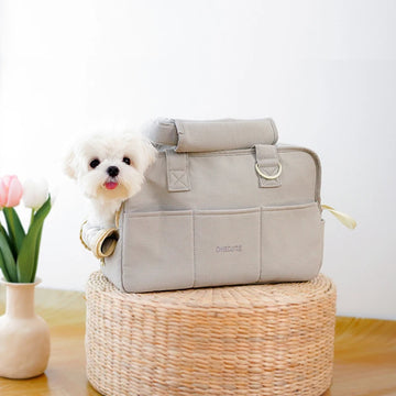 Craft Plus portable one-shoulder pet carrier bag with mesh sides and adjustable strap for comfortable pet transportation.