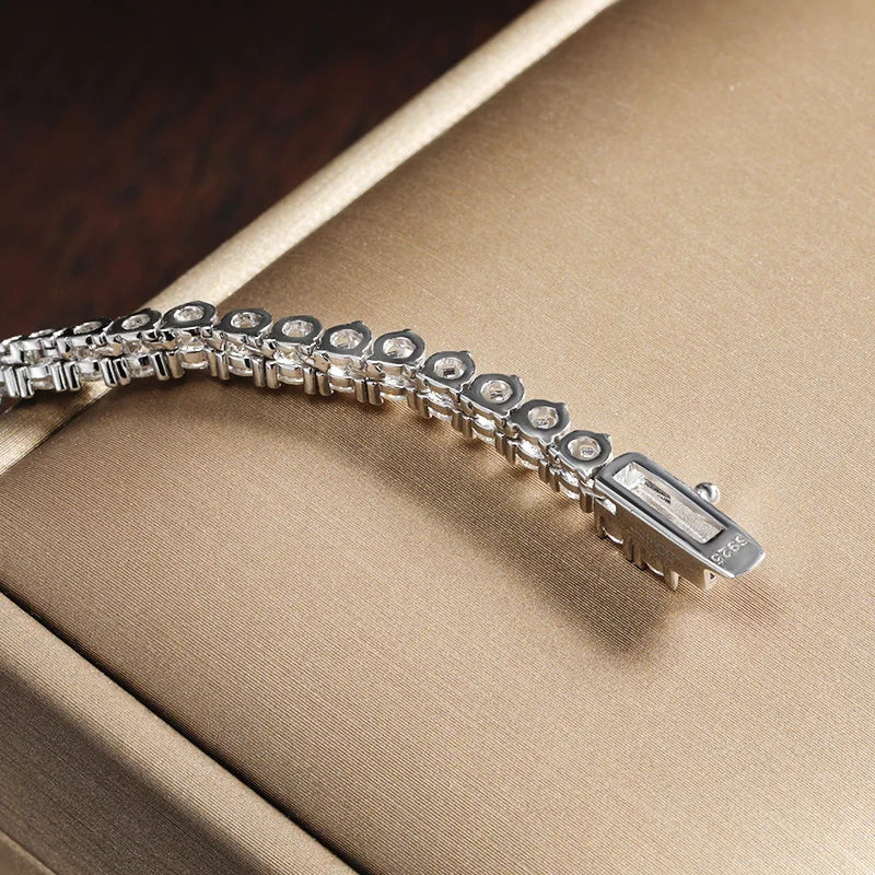 Sterling silver Moissanite tennis necklace with sparkling stones, crafted by Craft Plus, showcasing an elegant and timeless jewelry piece.