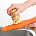 Craft Plus bamboo eco-friendly dish scrub brush with natural bristles for gentle cleaning of dishes and pots.